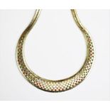 A 9ct tri-gold graduated necklace,