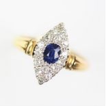 A diamond and untested sapphire set marquise shaped ring,