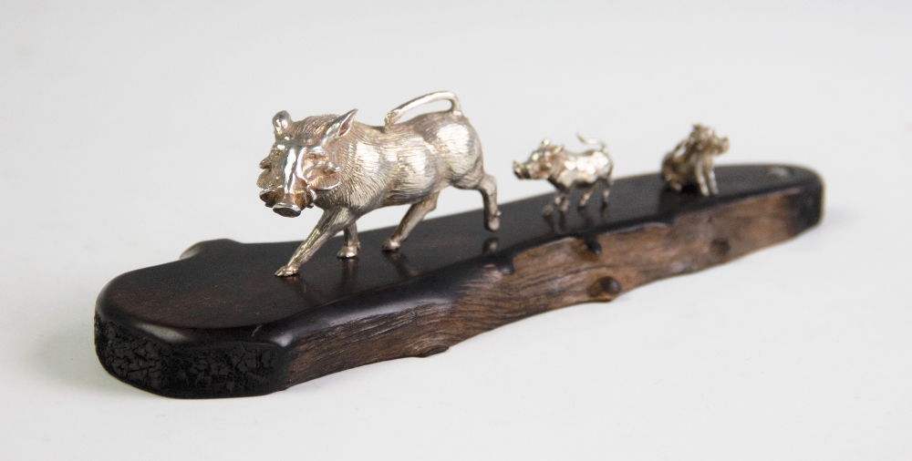 A silver model of a Warthog family by Patrick Mavros