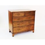 A George III mahogany chest of drawers, circa 1800, with two short and three long graduated drawers