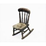 A Victorian painted child's rocking chair,