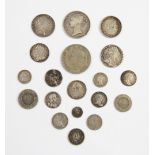 A selection of 18th century and later British and continental silver and white metal coins