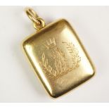 A Victorian crested locket, designed as a rectangular bi-fold pendant