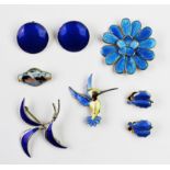 A selection of assorted enamelled Scandinavian jewellery,