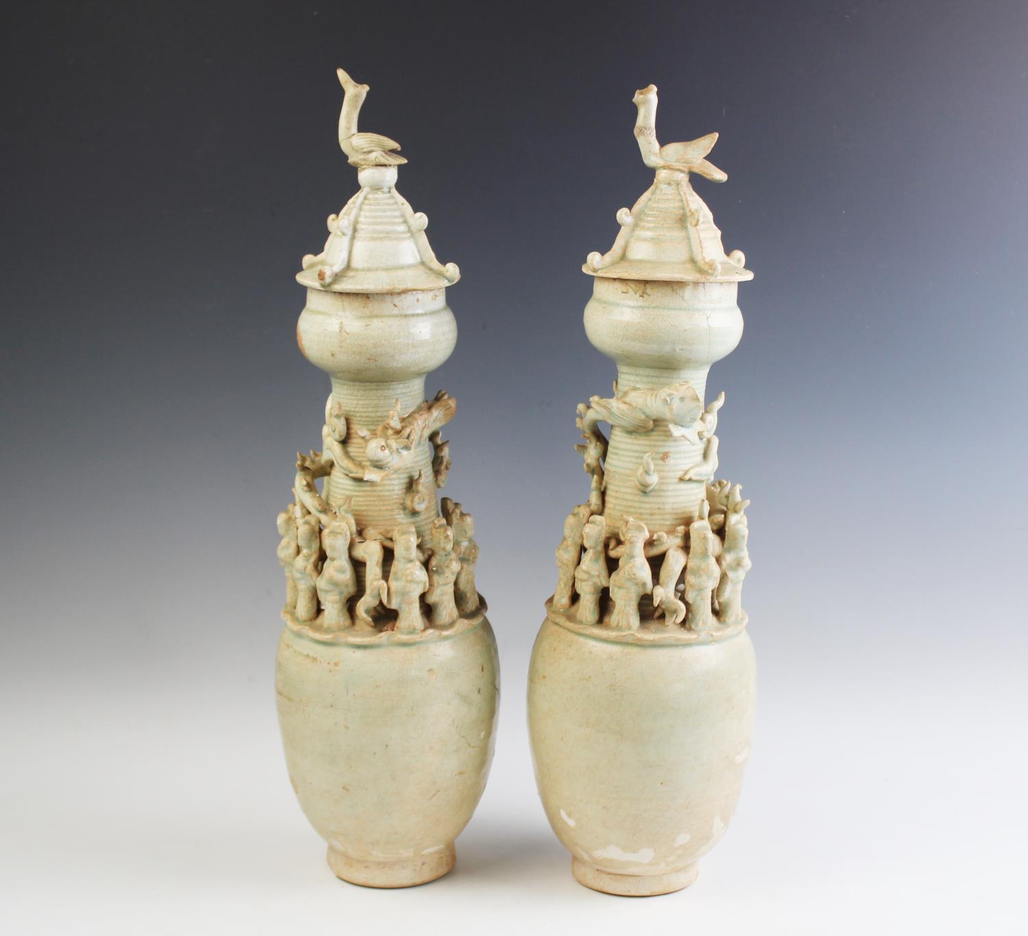 A pair of Chinese Qingbai funerary vases,