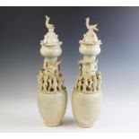 A pair of Chinese Qingbai funerary vases,