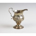 A George III silver milk jug,