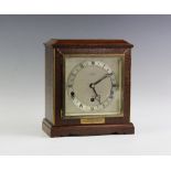 An Elliott of London eight-day oak presentation mantel clock,