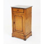 A Victorian golden oak marble top bedside cupboard,