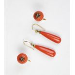 A pair of coral set drop earrings, each of pendeloque drop