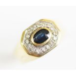 A sapphire and diamond cluster ring,