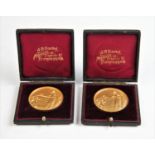Two 'Bolton Trades Exhibition 1898' gilt medallions, each within fitted A H Darby case