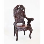 An early 20th century Japanese stained wood throne chair,