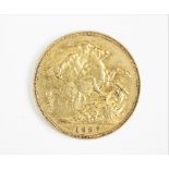 A Victorian gold sovereign dated 1887