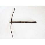 An antique iron and hardwood crossbow,