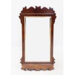 A George III style fretwork mirror,