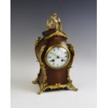 A French walnut and ormolu mantel clock