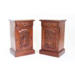 A pair of 19th century style carved hardwood bedside cupboards,