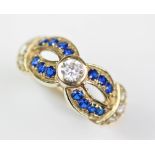 An untested sapphire set dress ring,