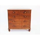 An early Victorian mahogany chest of two short and three graduated long drawers