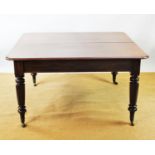A 19th century mahogany extending dining table,