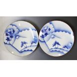 A pair of Japanese porcelain blue and white chargers,