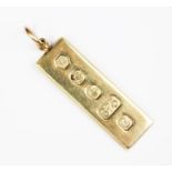 A 9ct gold ingot pendant,