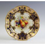 A Royal Worcester bowl with hand painted central panel by Albert Shuck,