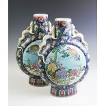 A large pair of Chinese porcelain moon flasks,