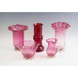 Four pieces of Victorian cranberry glass,