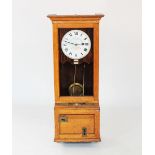 A 1930's oak cased Gledhill Brook Time Recorder,