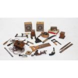 A selection of 19th century and later vintage tools, surveyor equipment and metal wares
