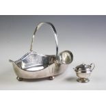 A George V silver swing handled basket,