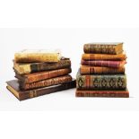 A collection of leather bound volumes,