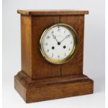An early 20th century oak cased eight-day mantel clock signed 'Charles Frodsham',
