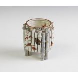 A Japanese porcelain Kutani brush pot,