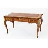 A Victorian walnut and birds eye maple marquetry inlaid bureau plat, circa 1840,