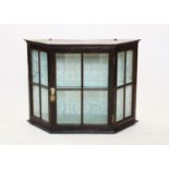 An early 20th century oak hanging wall display cabinet,