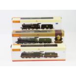 Three boxed Hornby OO scale model locomotives,