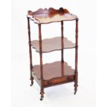 A Victorian mahogany three tier what-not or etagere,