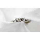 A three stone diamond ring,