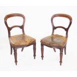 A set of six Victorian mahogany balloon back dining chairs,