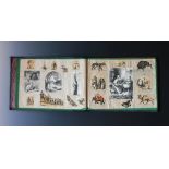 A Victorian landscape scrap album, containing hand coloured book plates,