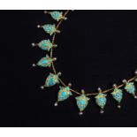 A turquoise and enamelled graduated fringe necklace, North India, probably Jaipur/Delhi, circa 1870