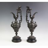 A pair of early 20th century cast spelter garnitures