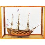 A vintage wooden scale model of HMS Victory,