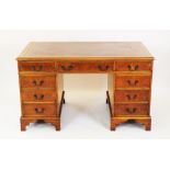 A reproduction burr oak twin pedestal writing desk,