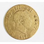 A George III gold half sovereign, dated 1817,