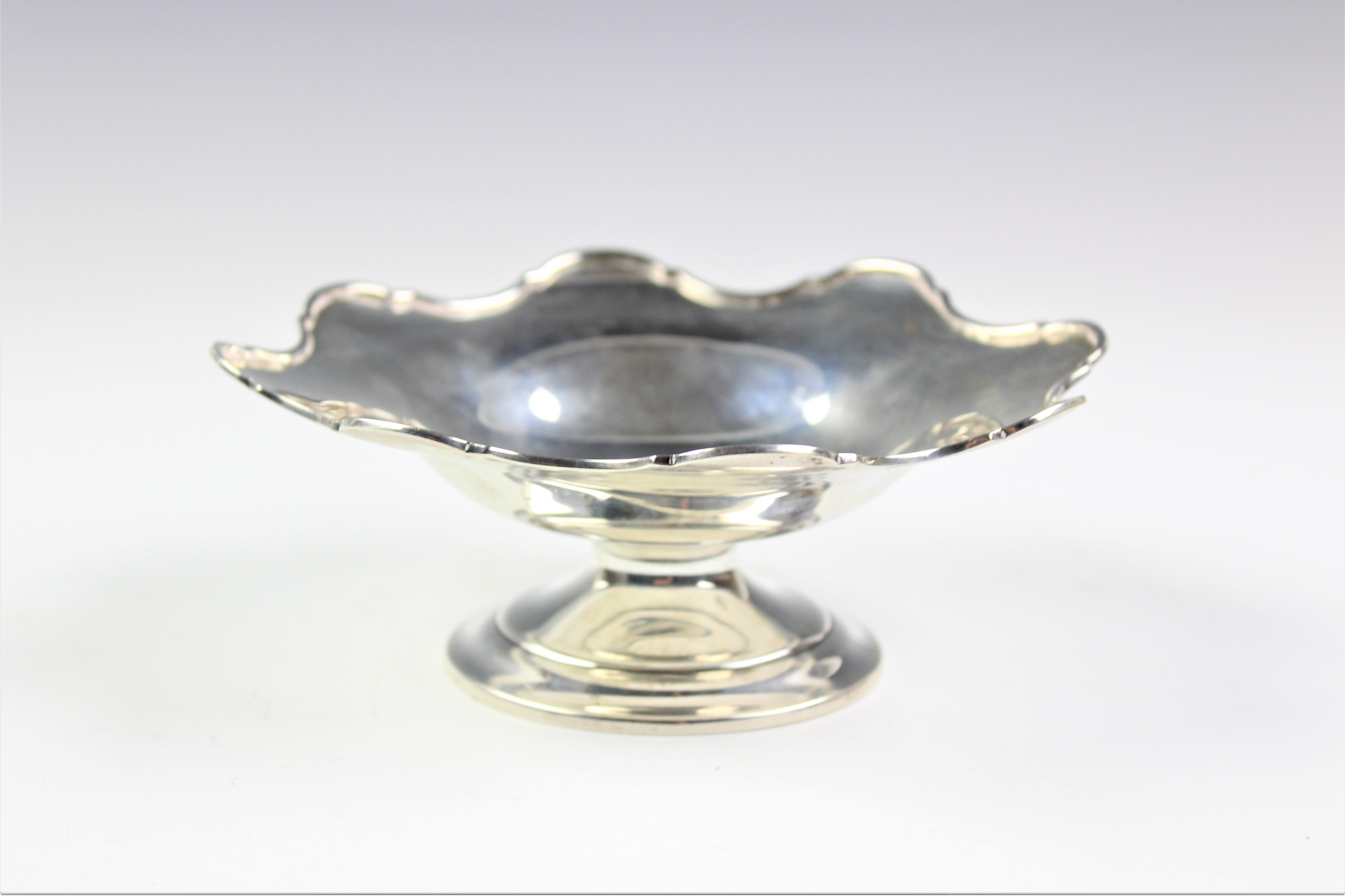 A George V silver pedestal bowl,