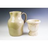 A large glazed earthenware jug,